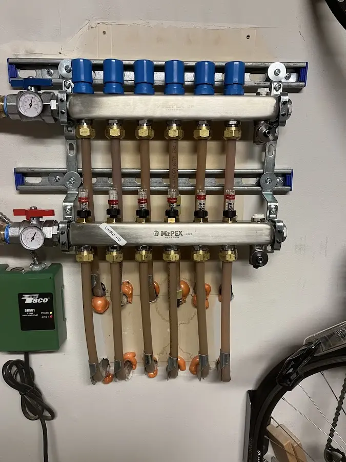 Plumber performing Sink Repair at a residential property in Taos